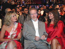 Ridley Scott, flanked by Egyptian actress Yusra (left) and his partner, Giannina Facio, at the Marrakech International Film Festival, October 2003.